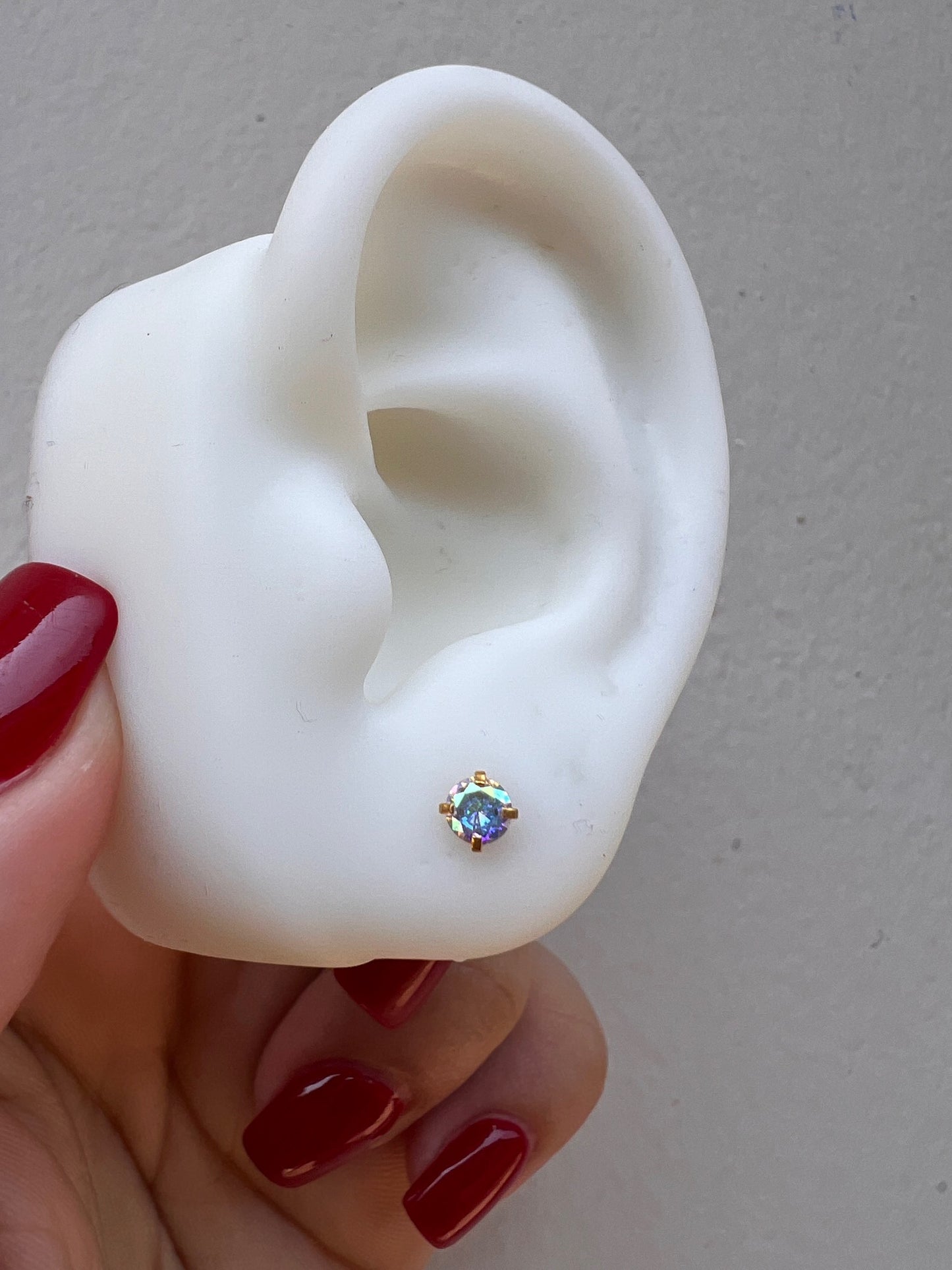 Piercing gold punto tornasol Gde