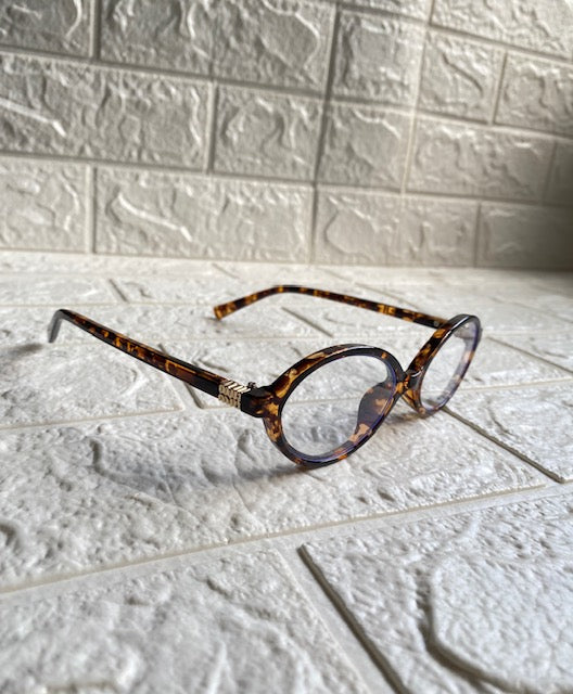 Lentes Miu Miu Ovalados Leopardo con Clear