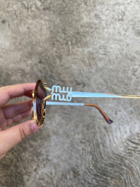 Lentes Miu Miu Ovalados Negros