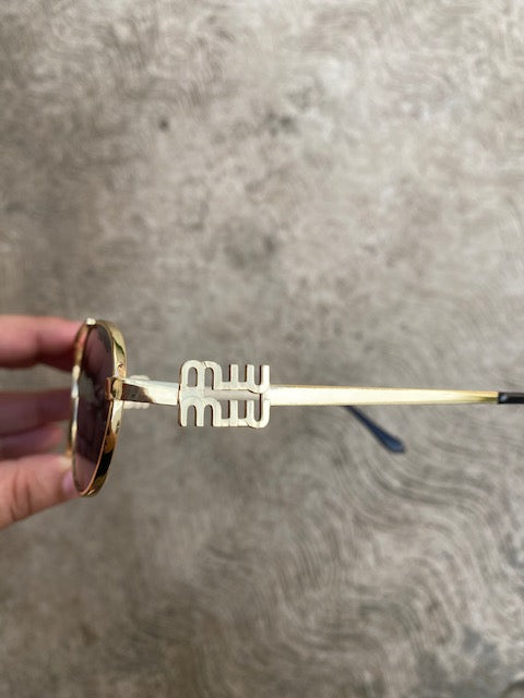 Lentes Miu Miu en tendencia color negro