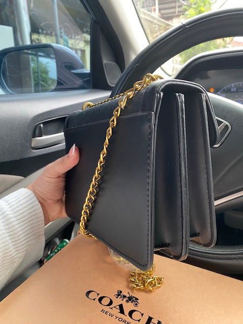 Cartera Coach Negra
