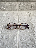 Lentes Miu Miu Ovalados Leopardo con Clear