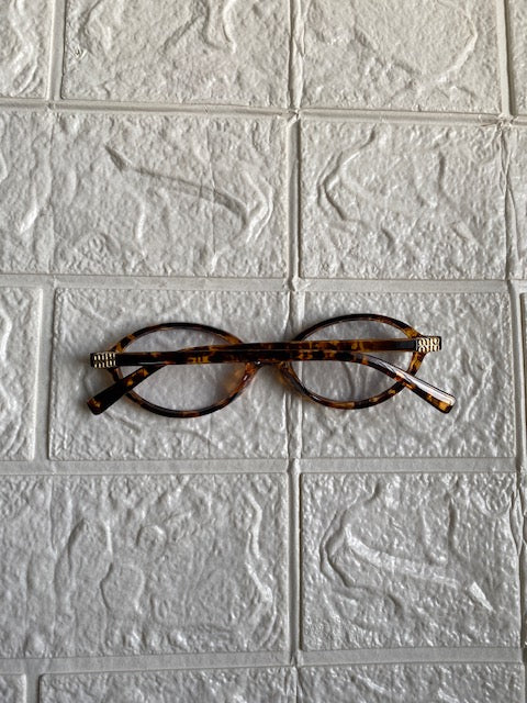 Lentes Miu Miu Ovalados Leopardo con Clear