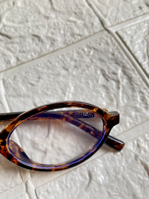 Lentes Miu Miu Ovalados Leopardo con Clear