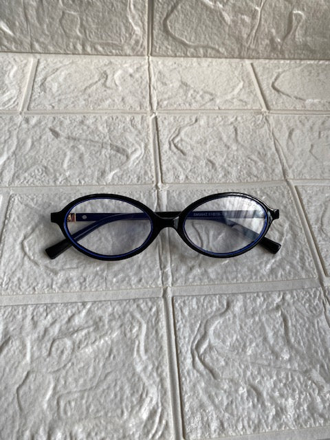 Lentes Miu Miu Ovalados Negro con Clear