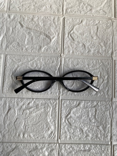 Lentes Miu Miu Ovalados Negro con Clear