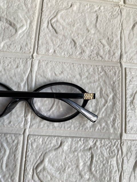 Lentes Miu Miu Ovalados Negro con Clear