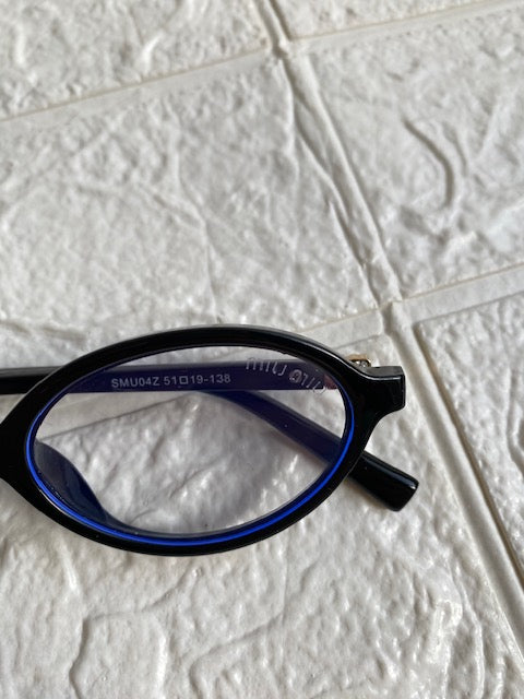Lentes Miu Miu Ovalados Negro con Clear