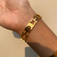 Brazalete Carolina Herrera Gold