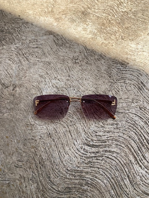 Lentes tipo Fendi Rectangulares Sin Aro Negro Degradado