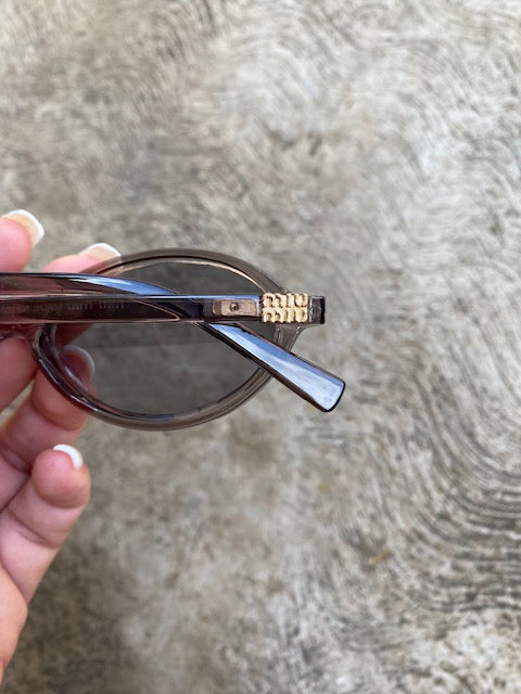 Lentes Miu Miu Ovalados Gris