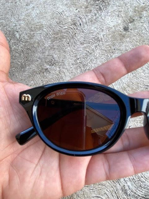 Lentes Miu Miu  Ovalados Cafe con Negro