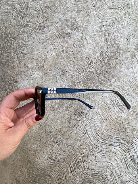 Lentes Miu Miu  Ovalados Cafe con Negro