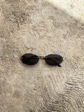 Lentes Tipo Miu Miu Ovalado Negros Sin Aro