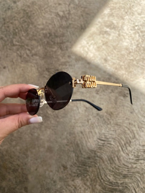 Lentes Tipo Miu Miu Ovalado Negros Sin Aro
