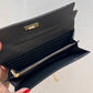 Monedero negro HERMES cierre BIRKIN