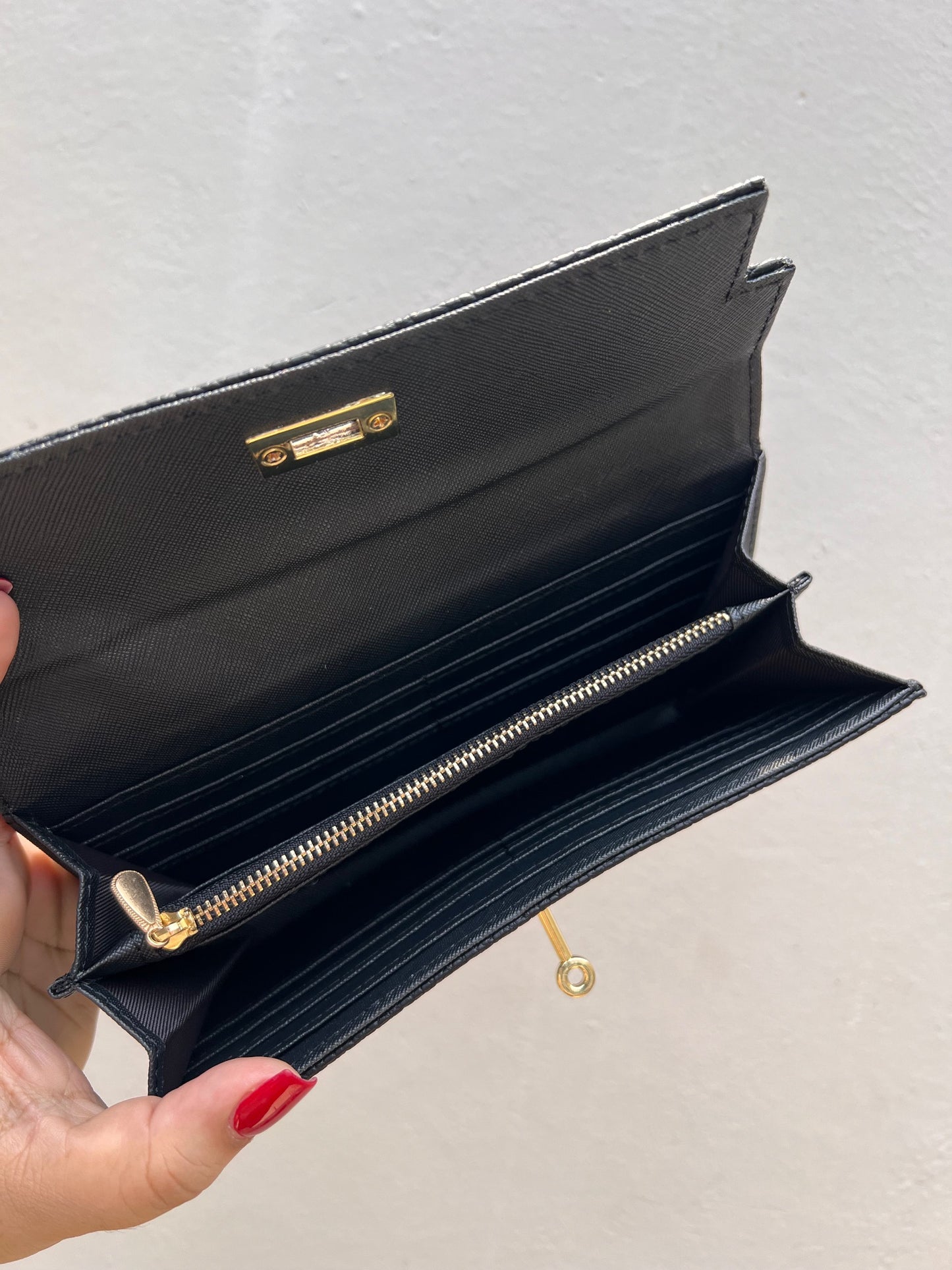 Monedero negro HERMES cierre BIRKIN