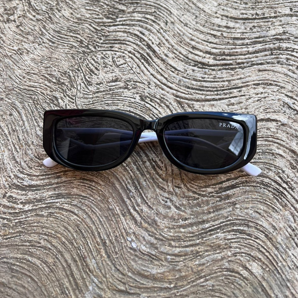 Lentes Black and White Prada