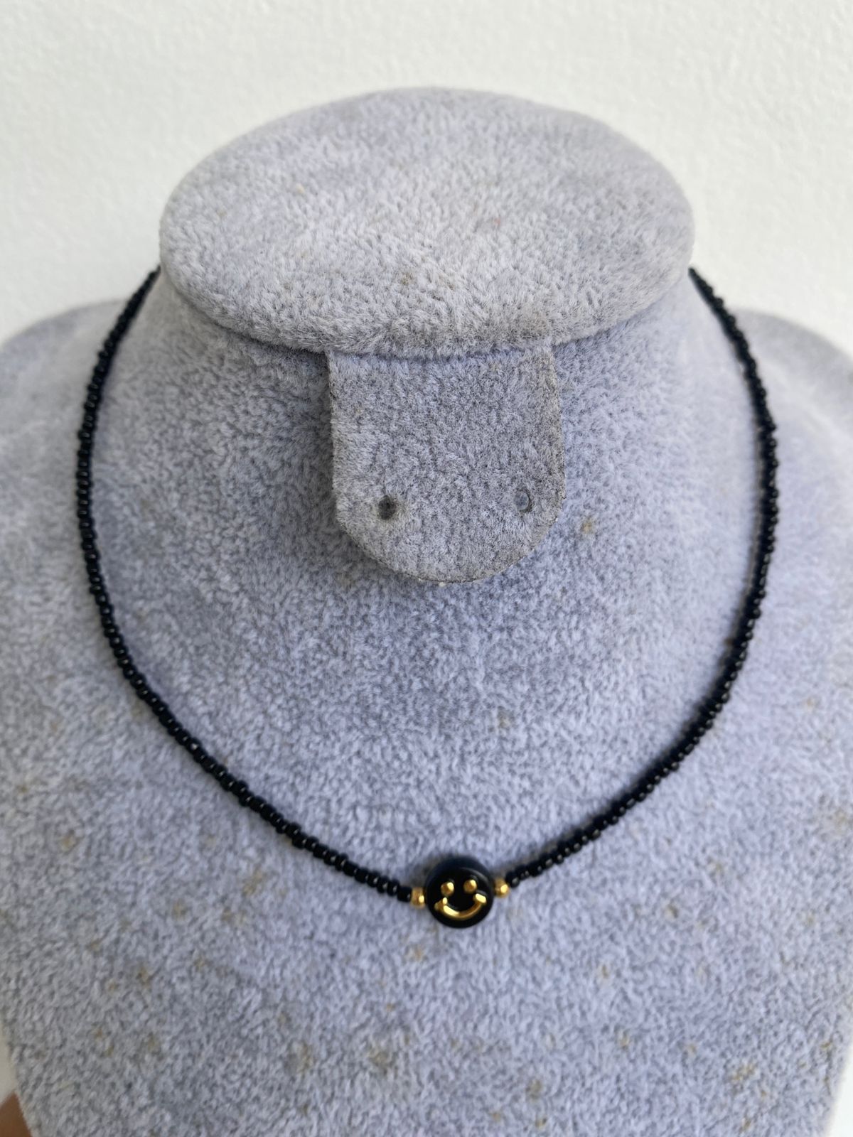 Chocker black happy face
