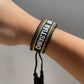Pulsera CD Negro y Gold